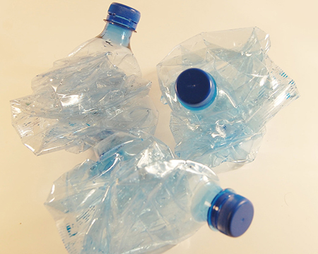Compressing PET Bottles for Recycling